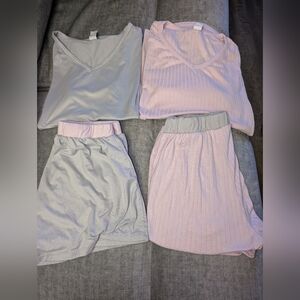 Two sets of women small pjs. Shorts with tees.